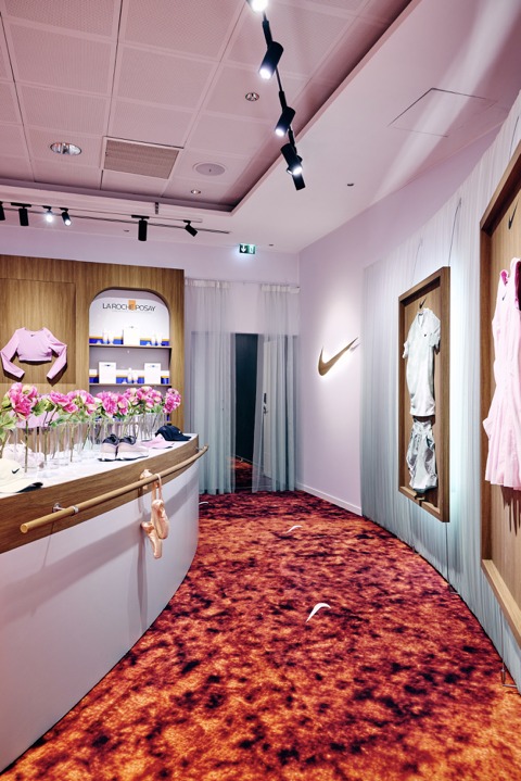 Molitor fitting room with ballet barre, peonies and La Roche-Posay corner